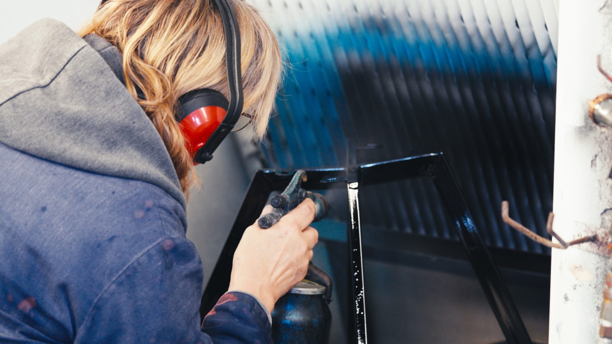 Worker using stove enamelling